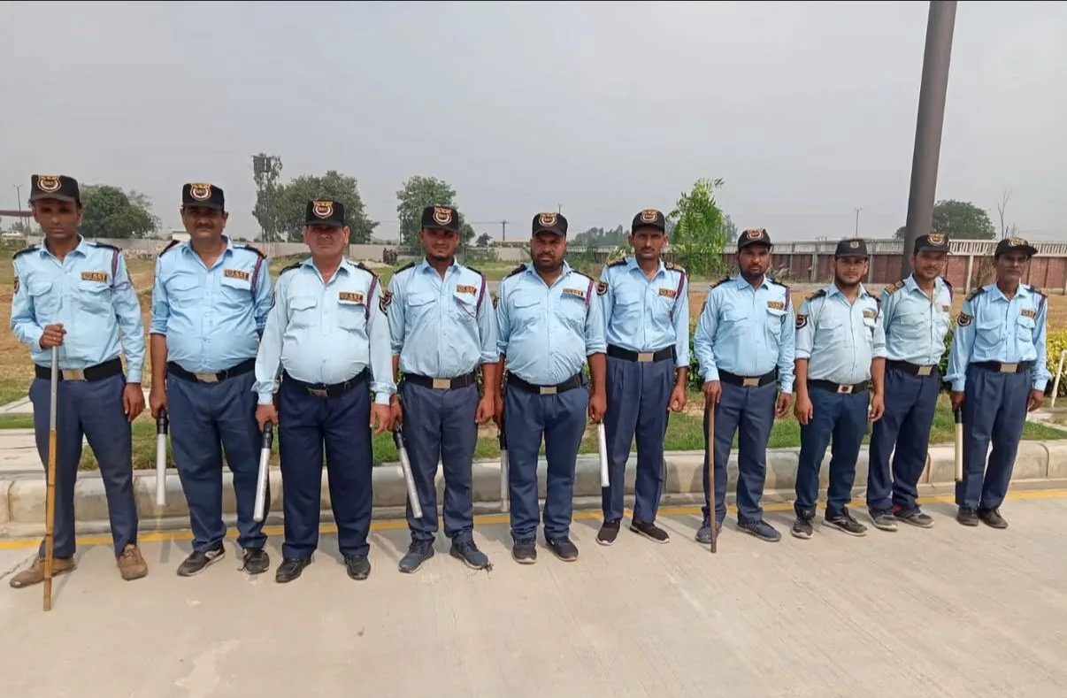 SST Security Agency team lineup at an industrial location