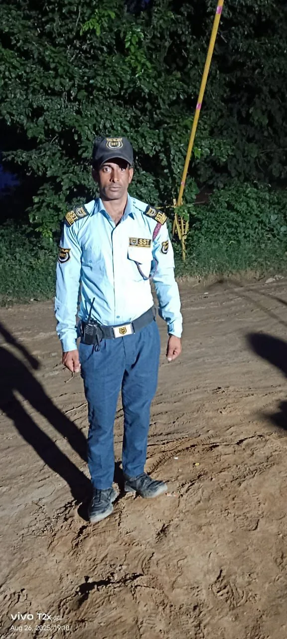 SST Security Agency guard on outdoor night duty