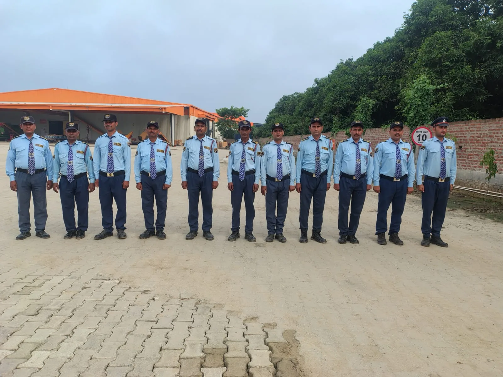 SST Security Agency uniformed team lined up at a work location